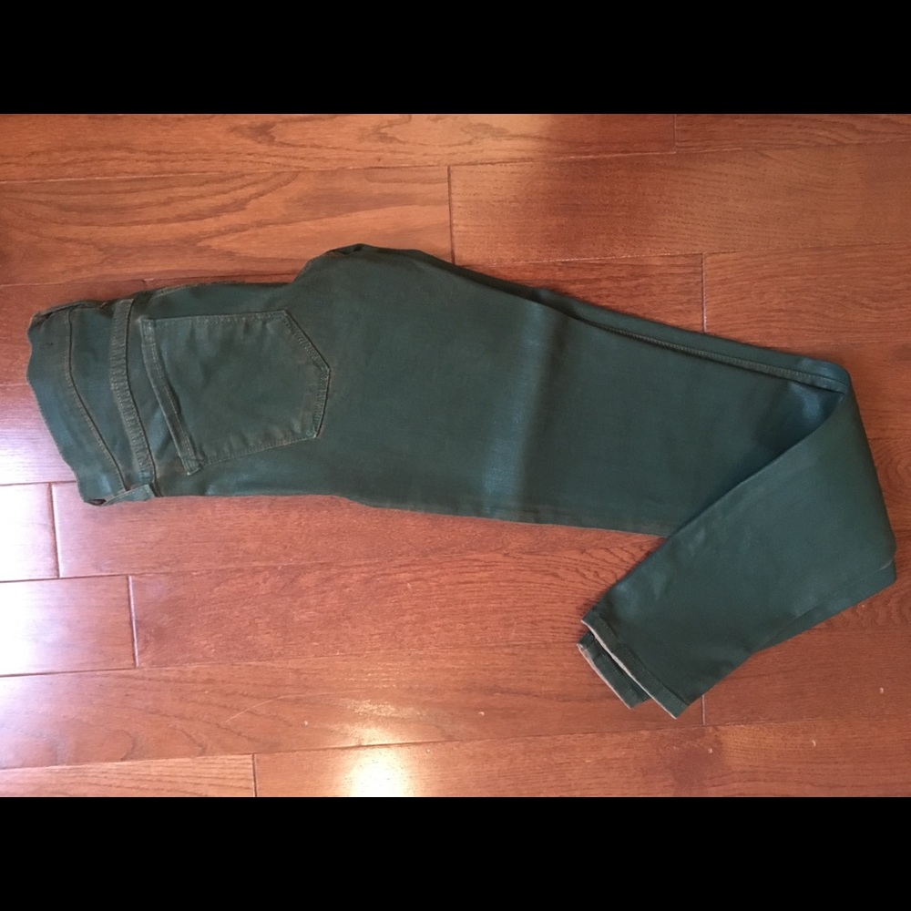 Green plastic coated jeans